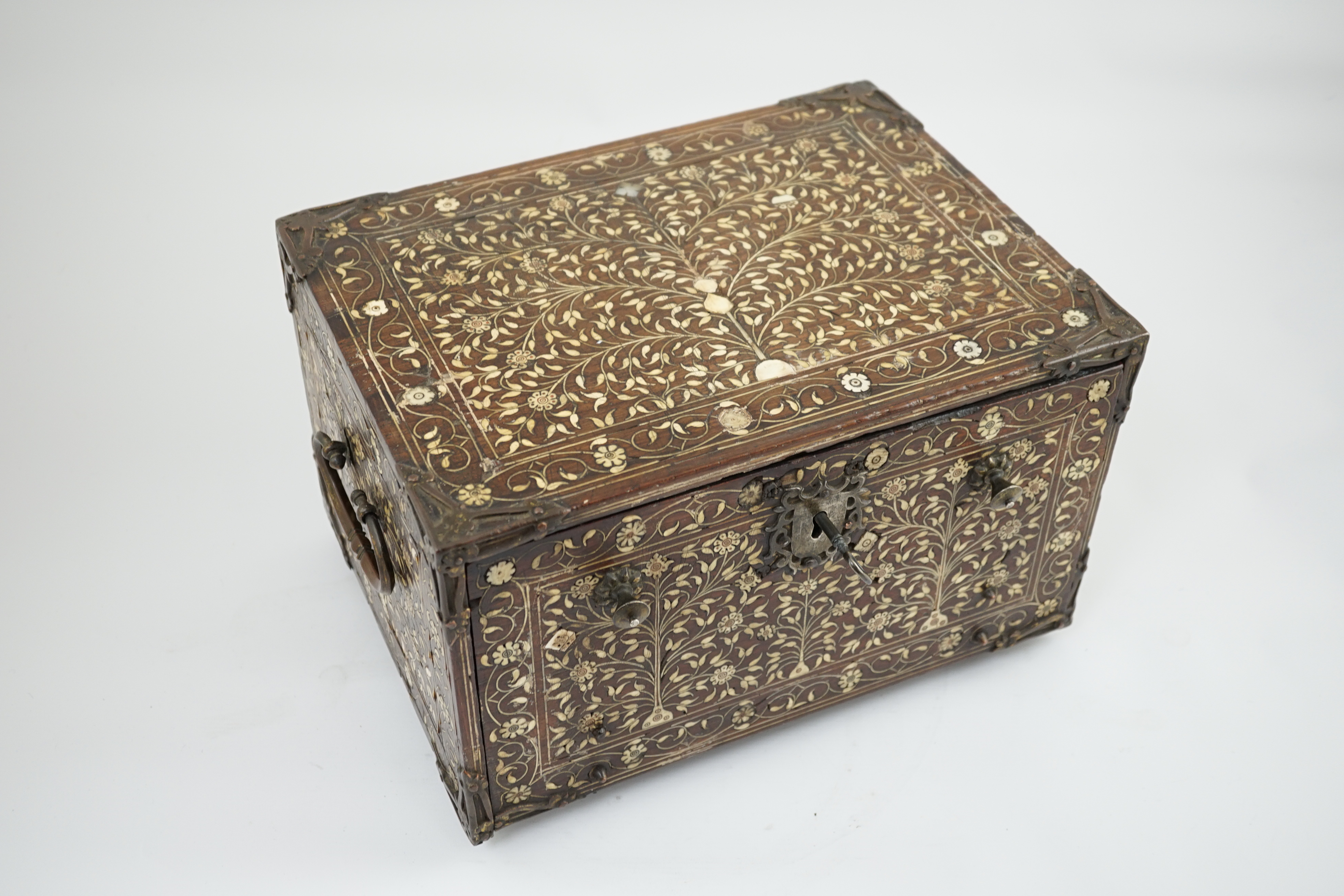 An early 17th century Indo-Portuguese ivory inset hardwood travelling chest